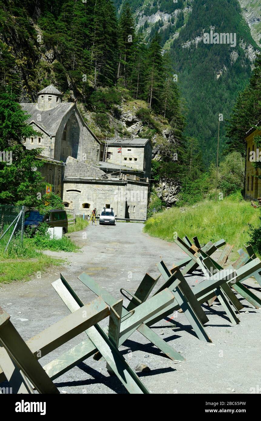 Nauders, Austria - June 25th 2014: Fortress Nauders and tank barrier on the road to Reschenpass, a public open air exhibition in Inn valley, Tyrol Stock Photo