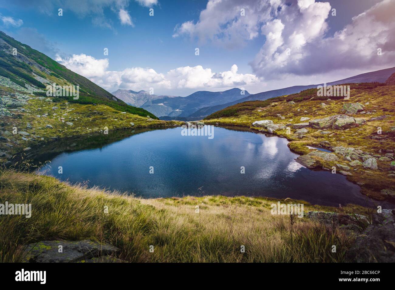 Lake landscape in the mountains, breathtaking view Stock Photo - Alamy