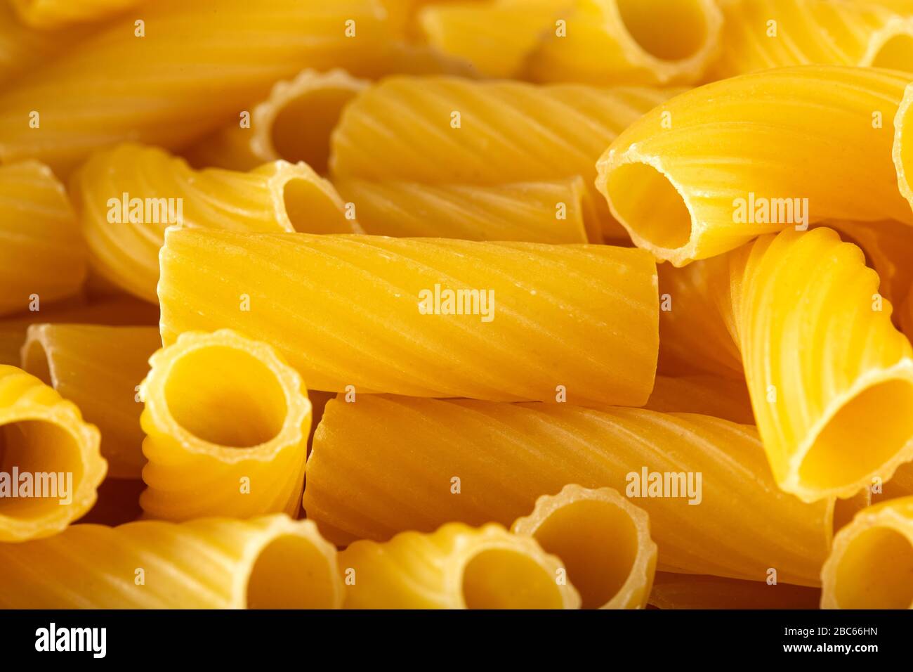 Heap of tortiglioni pasta - close up view Stock Photo