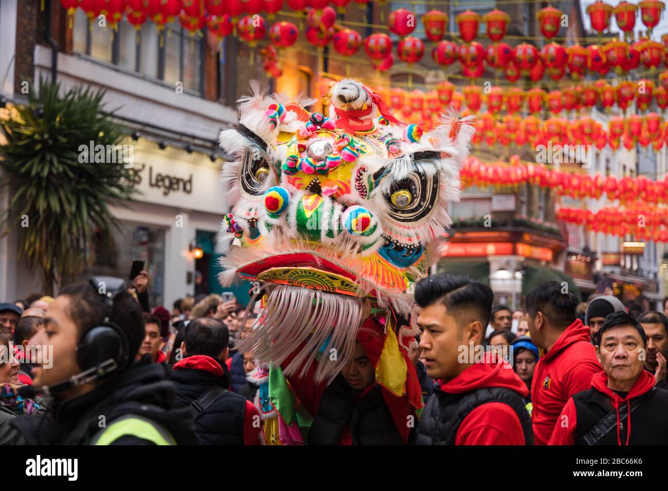 Chinese Lion / Dragon dance at 2020 new year celebrations in Chinatown, London. Stock Photo