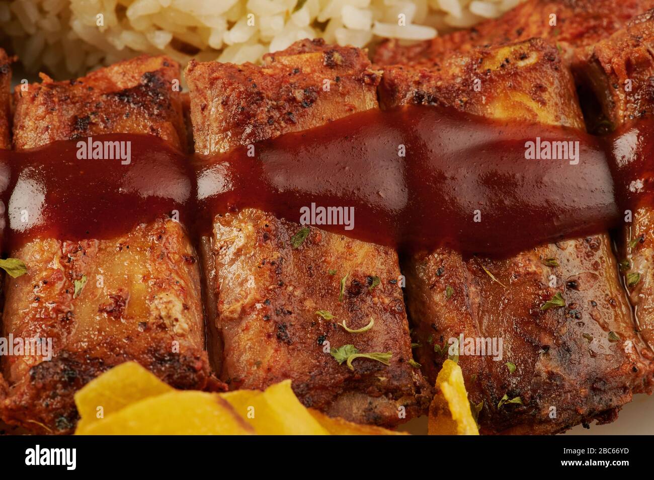 Close up of bbq grilled pork ribs with tomato ketchup Stock Photo