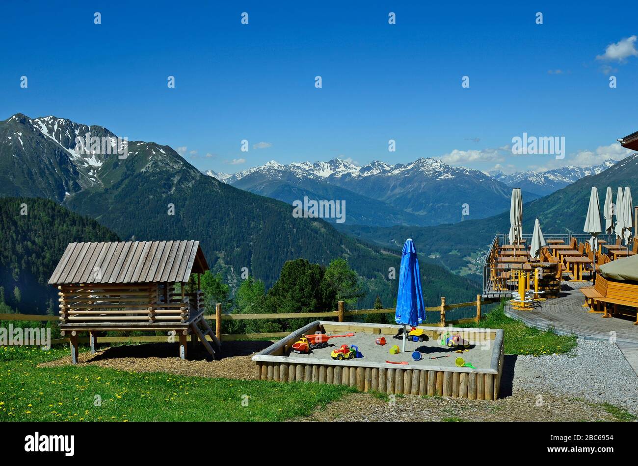 Austria, Tirol, view from terrace with sandpit over Pitztal and Tyrolean alps Stock Photo