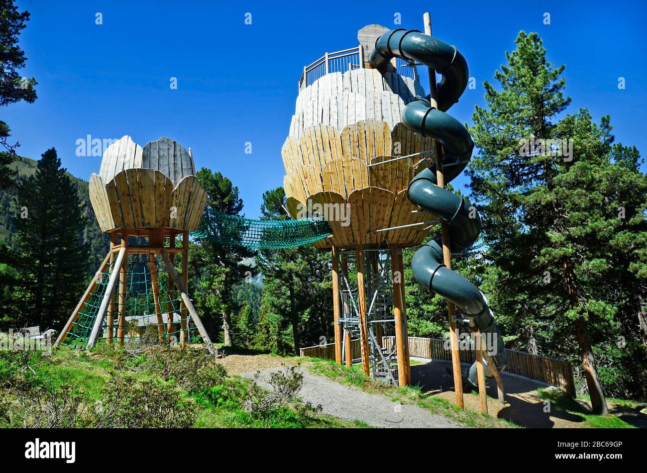 Jerzens, Austria - June 24th 2016: Children playground and funny lookout with helter-skelter slide on Hochzeiger mountain in Tyrol Stock Photo