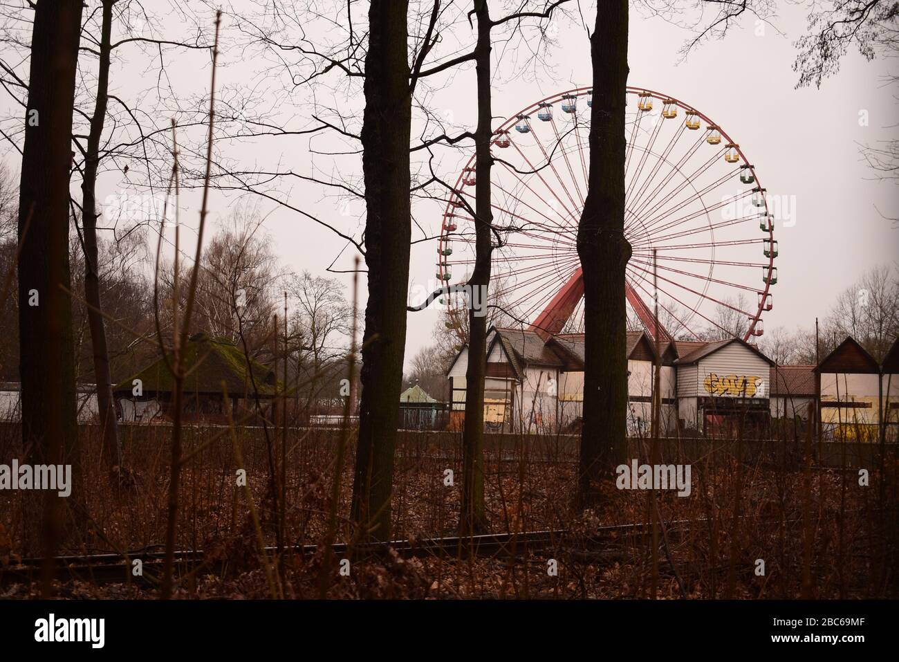 Abandoned ferris wheel in spreepark planterwald in former east Berlin Stock Photo