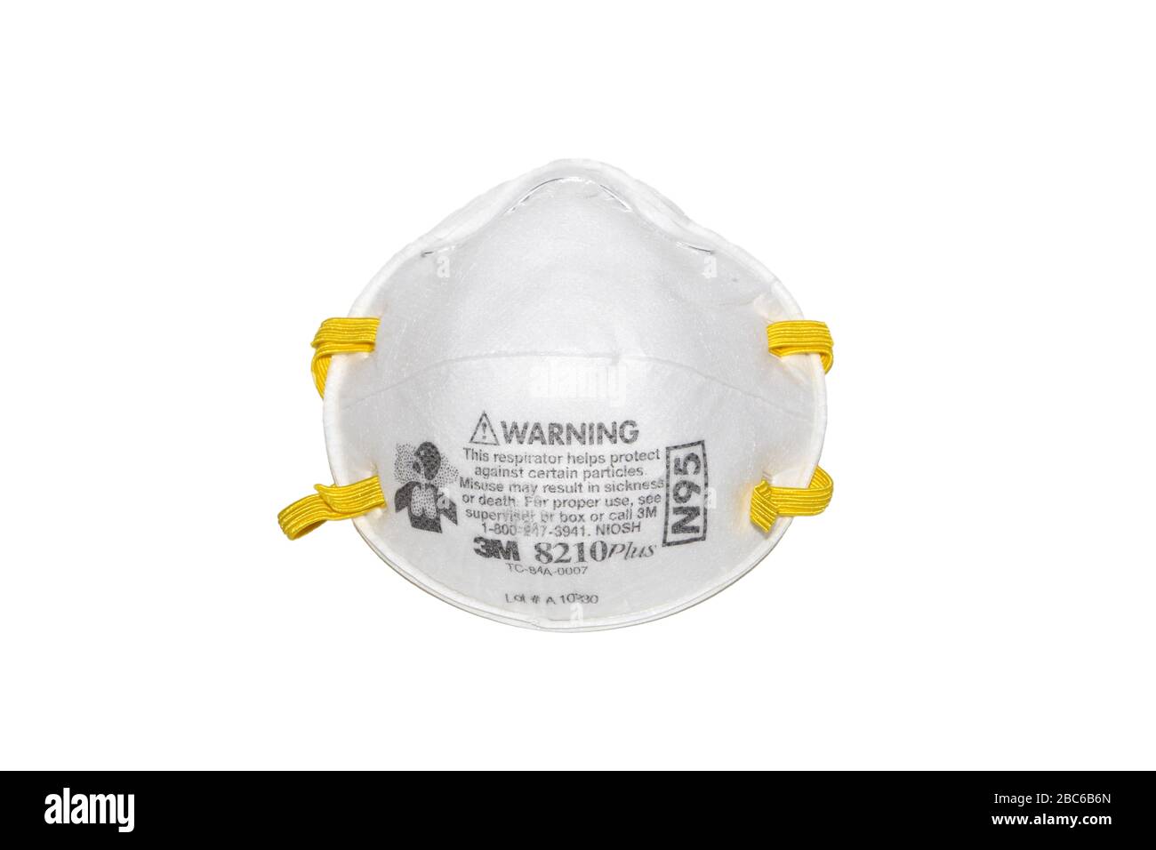 An N95 respirator face mask isolated on a white background. cutout image for illustration and editorial use. Stock Photo