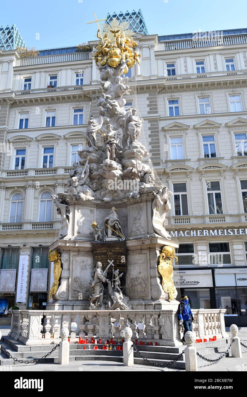 Vienna, Austria. 3rd Apr, 2020. Already the third week of exit restrictions in Austria. Candles in front of the plague column at the ditch for the victims of COVID-19.  Credit: Franz Perc/Alamy Live News Stock Photo