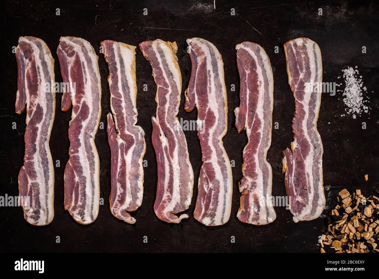 Streaky smoked bacon rashers Stock Photo