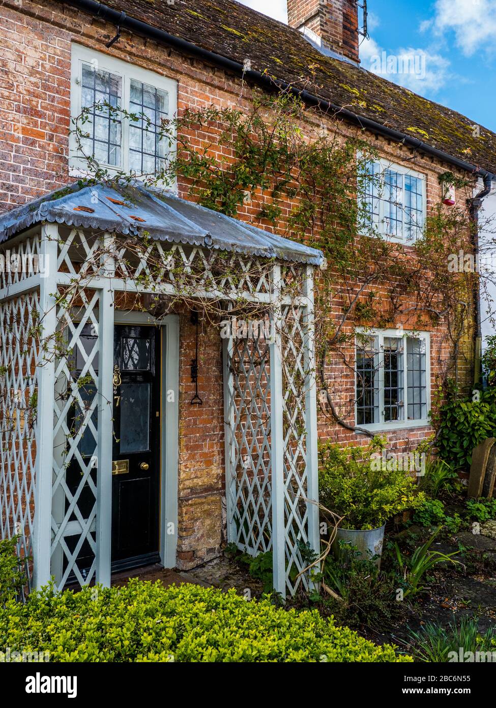 Village House with Porch, Great Bedwyn, North Wessex Downs, Wiltshire, England, UK, GB. Stock Photo