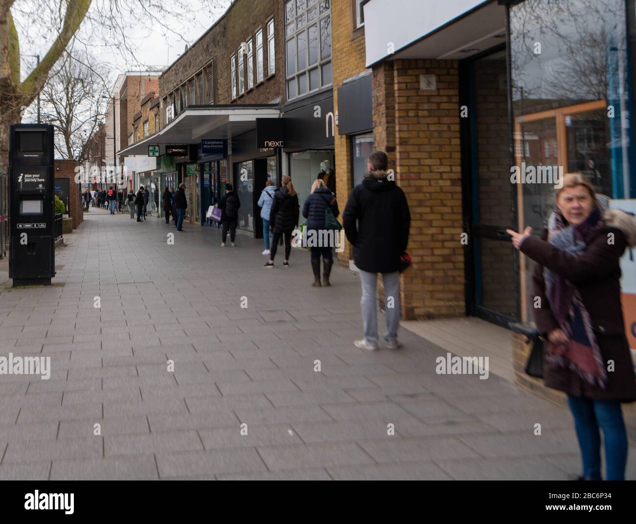 Brentwood Essex, UK. 3rd Apr, 2020. Larger numbers of cars and pedestrians in Brentwood High Street. during the covid lockdown. In particular large lines outside retail banks There was over 70 people in the queue for Marks and Spenser Credit: Ian Davidson/Alamy Live News Stock Photo