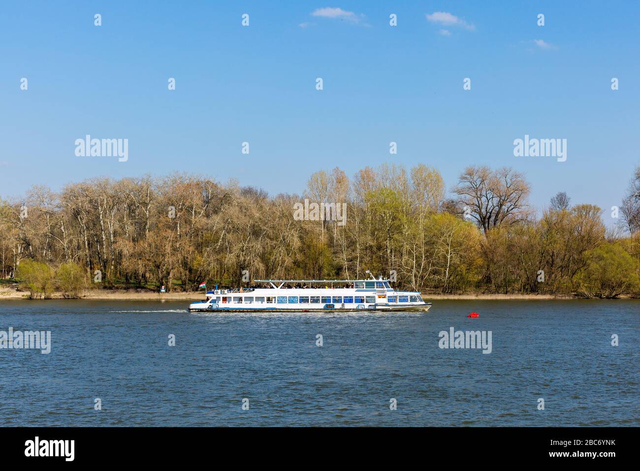 Tourist boat on Szentendre branch of Danube River on sunny day. Stock Photo