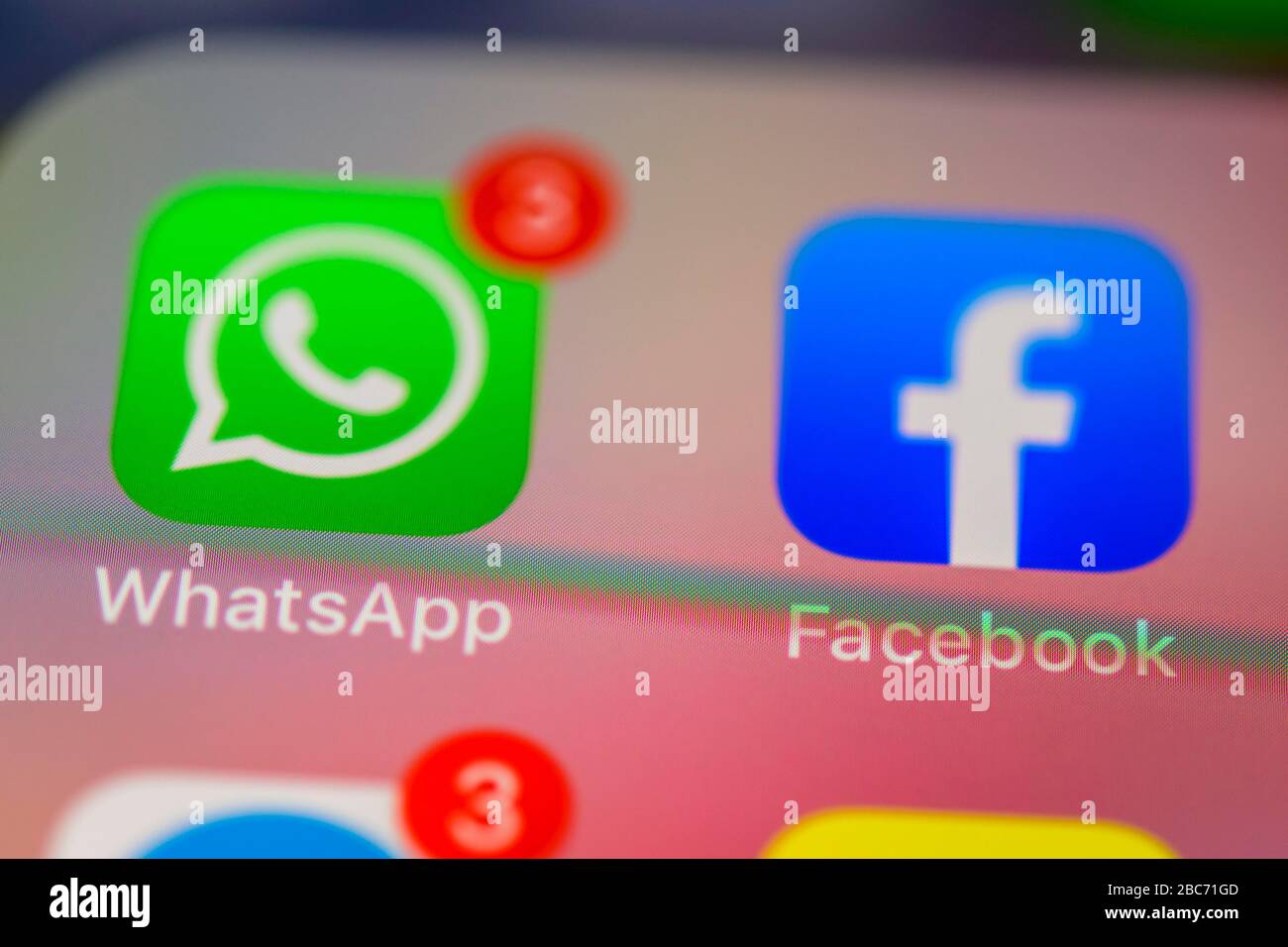 Facebook and WhatsApp, social apps, app icons, display on display of mobile phone, smartphone, detail, full format Stock Photo