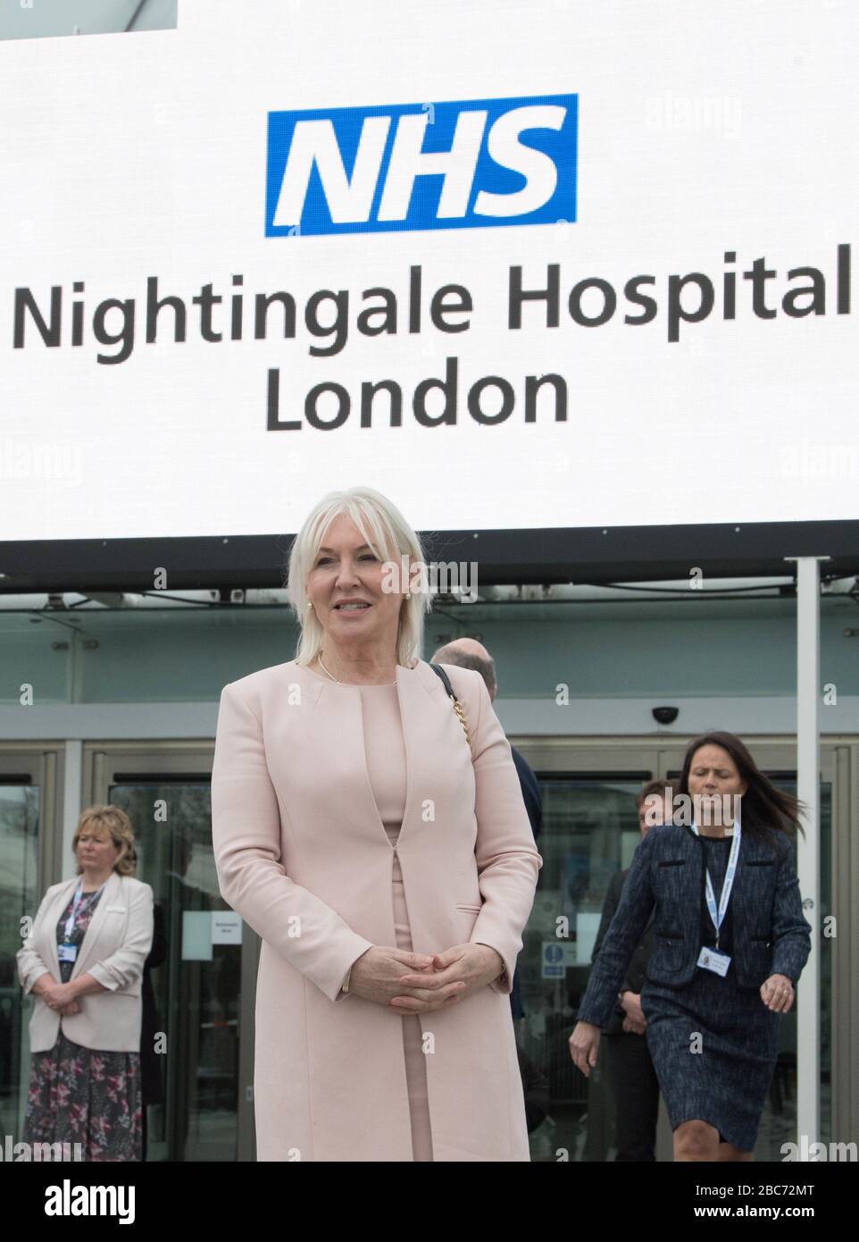 Nadine Dories MP at the opening of the NHS Nightingale Hospital at the ExCel centre in London, a temporary hospital with 4000 beds which has been set up for the treatment of Covid-19 patients. PA Photo. Picture date: Friday April 3, 2020. Split into more than 80 wards containing 42 beds each, the facility will be used to treat Covid-19 patients who have been transferred from other intensive care units across London. See PA story HEALTH Coronavirus Charles. Photo credit should read: Stefan Rousseau/PA Wire Stock Photo