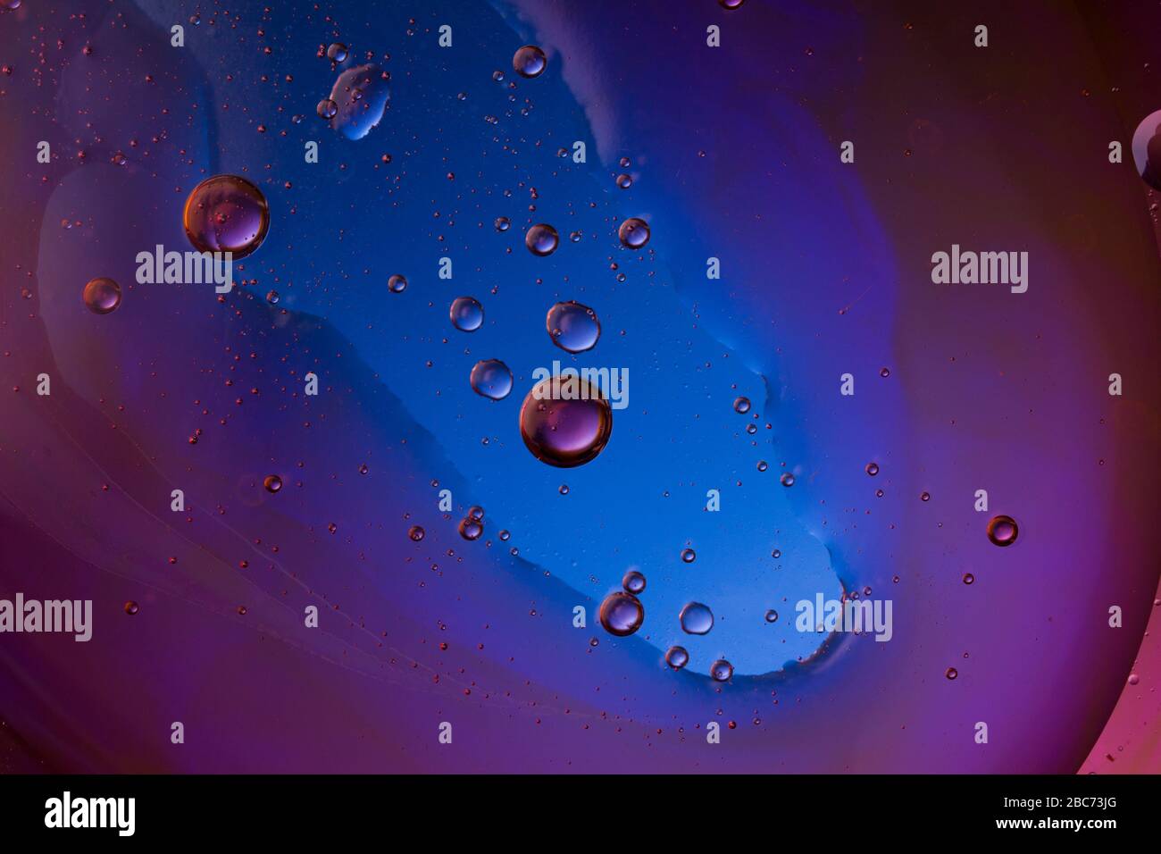 Abstract Violet Purple Liquid Background. Close Up Stock Photo