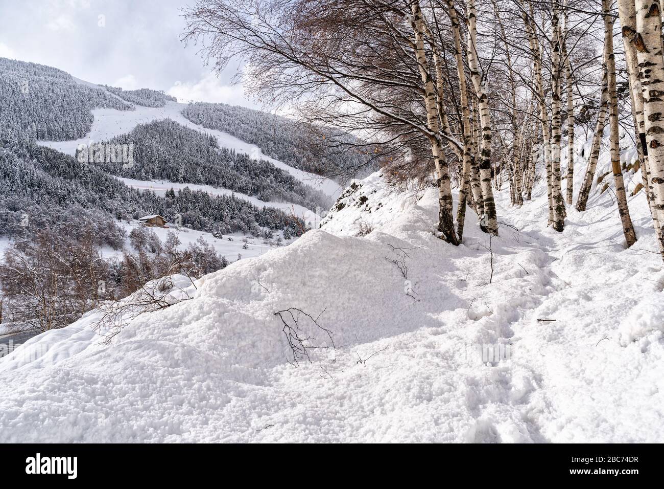 Aerial view the Pyrenees Mountains in Andorra , Grandvalira ski area in El Tarter one winter day . Stock Photo
