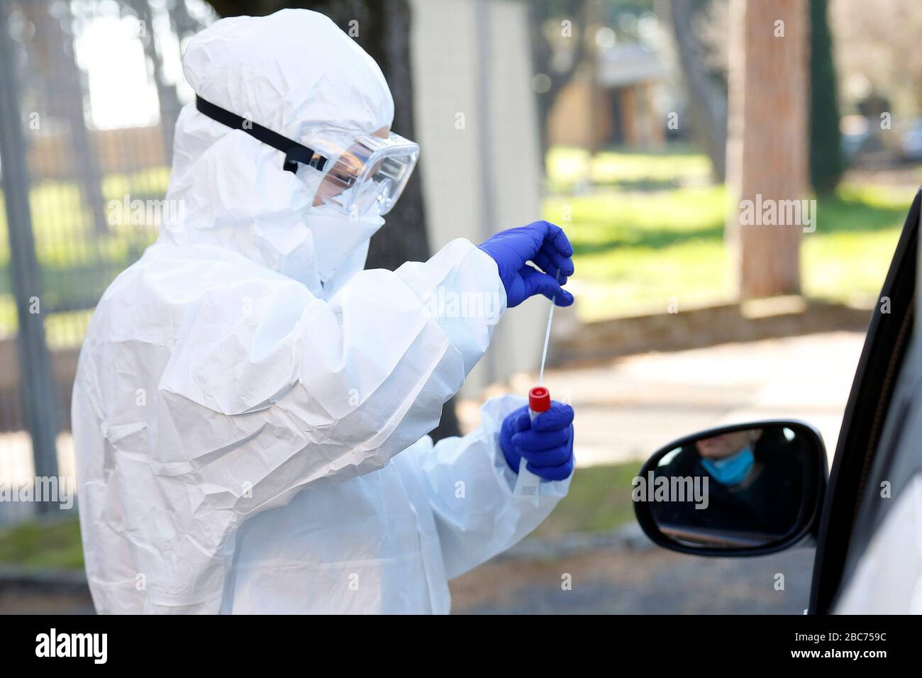 Rome, Italy. 03rd Apr, 2020. Santa Maria della Pieta'. Coronavirus emergency.  Due to the spread of Covid-19 virus, Italy started a new procedure, a drive-through COVID-19 pharyngeal and nasal swab to test possible positivity to the infection . In the pictures, medical workers testing doctors and nurses of San Filippo Neri hospital.  Photo Samantha Zucchi Insidefoto Credit: insidefoto srl/Alamy Live News Stock Photo