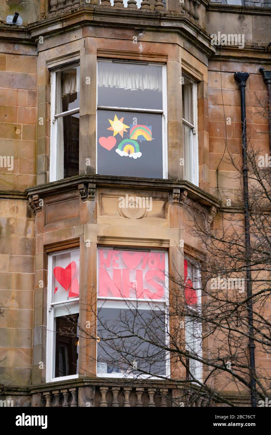 Glasgow, Scotland, UK. 3 April, 2020. Images from the south side of Glasgow at the end of the second week of Coronavirus lockdown. Pictured; hand drawn rainbows and messages in windows of flat in Govanhill. Iain Masterton/Alamy Live News Stock Photo