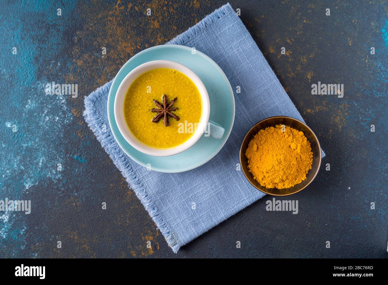 Flay lay Ayurvedic golden turmeric latte milk tea made with turmeric