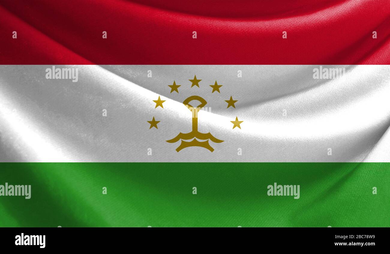 Realistic flag of Tajikistan on the wavy surface of fabric Stock Photo