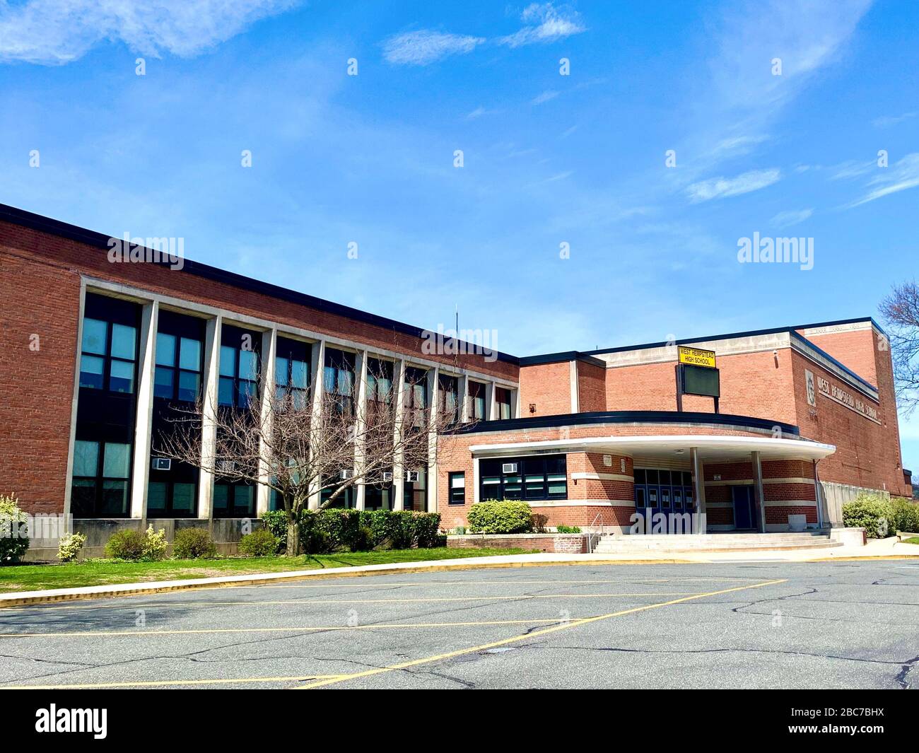 WEST HEMPSTEAD,  NEW YORK - APRIL 1, 2020:  West Hempstead High School in Nassau County New York stand empty due to mandatory closure amid Covid-19 Co Stock Photo