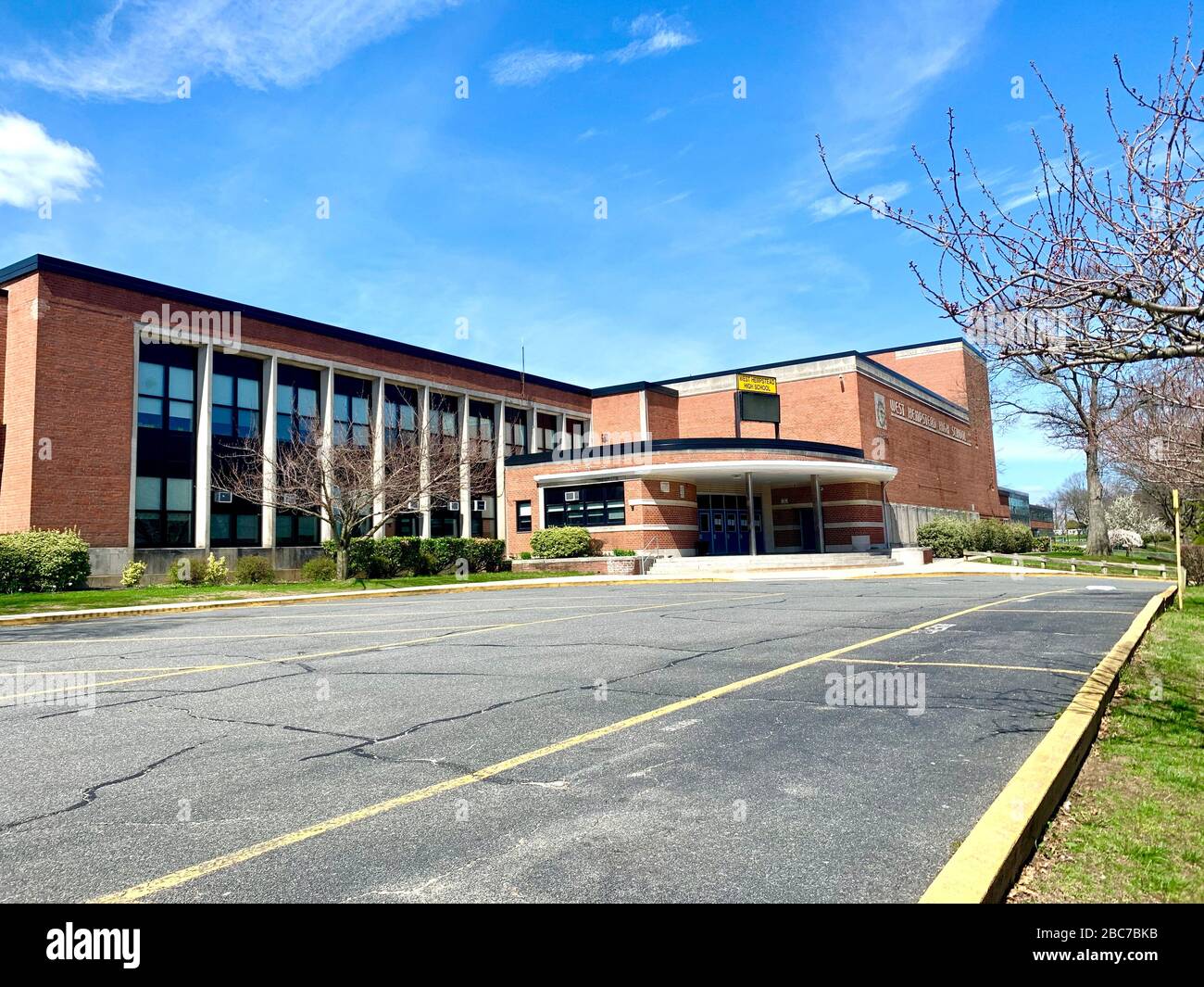 WEST HEMPSTEAD,  NEW YORK - APRIL 1, 2020:  West Hempstead High School in Nassau County New York stand empty due to mandatory closure amid Covid-19 Co Stock Photo