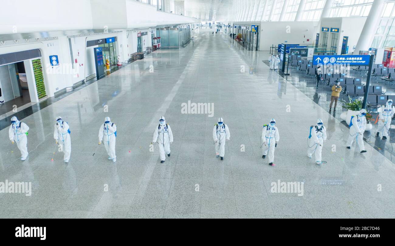 Wuhan, China. 03rd Apr, 2020. Wuhan, China. 03rd Apr, 2020. Aerial photo taken on April 3, 2020 shows firefighters conducting disinfection at the Terminal 3 of Wuhan Tianhe International Airport in Wuhan, central China's Hubei Province. Wuhan, the Chinese city hardest hit by the novel coronavirus outbreak, conducted disinfection Friday on the local airport as operations will soon resume on April 8 when the city lifts its travel restrictions. Credit: Xinhua/Alamy Live News Stock Photo