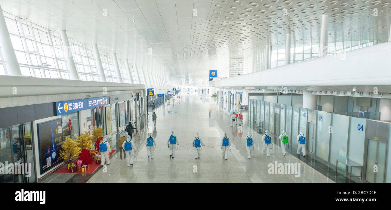 Wuhan, China. 03rd Apr, 2020. Wuhan, China. 03rd Apr, 2020. Aerial photo taken on April 3, 2020 shows firefighters conducting disinfection at the Terminal 3 of Wuhan Tianhe International Airport in Wuhan, central China's Hubei Province. Wuhan, the Chinese city hardest hit by the novel coronavirus outbreak, conducted disinfection Friday on the local airport as operations will soon resume on April 8 when the city lifts its travel restrictions. Credit: Xinhua/Alamy Live News Stock Photo