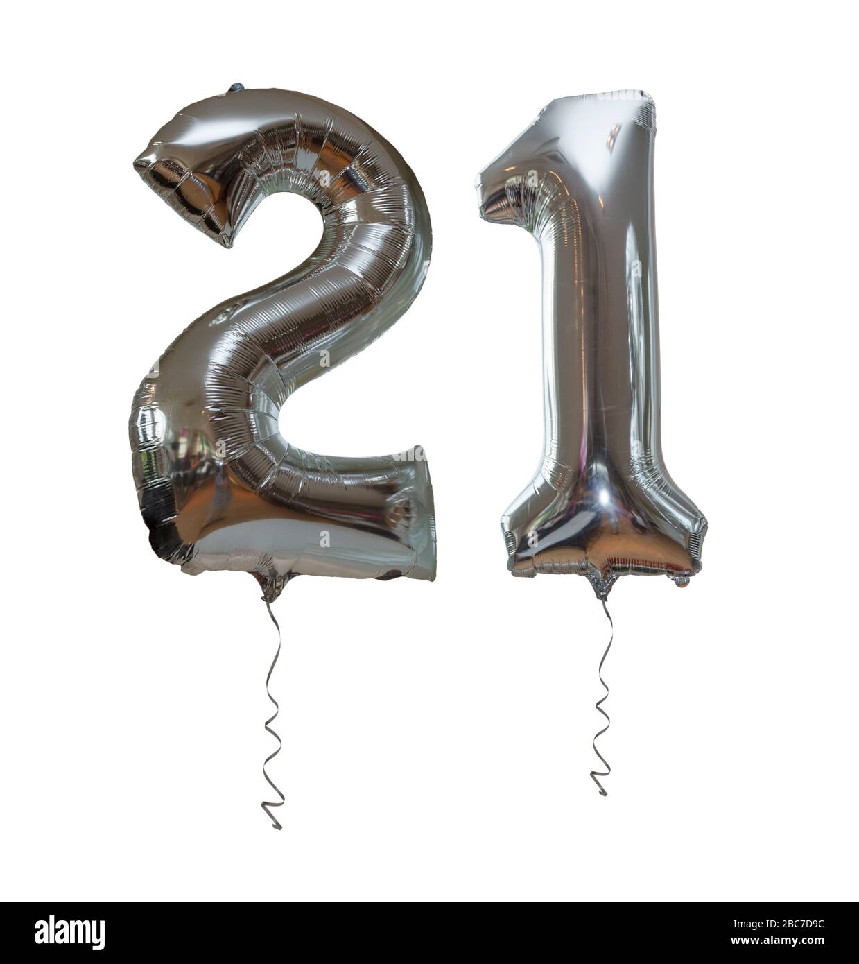 Silver number 21 party balloons isolated on a white background with silver ribon Stock Photo