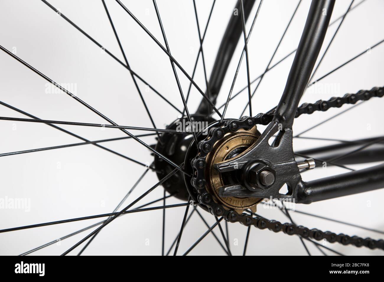 Close up of a single speed bike wheel hub Stock Photo