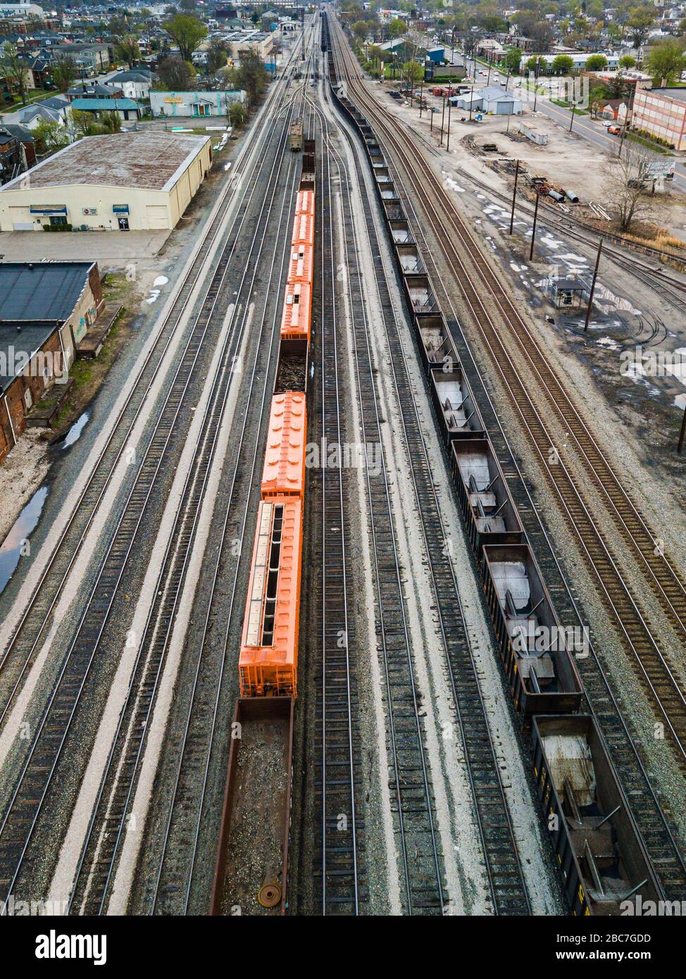 Aerial perspective shot over the C&O railroad train tracks that cross