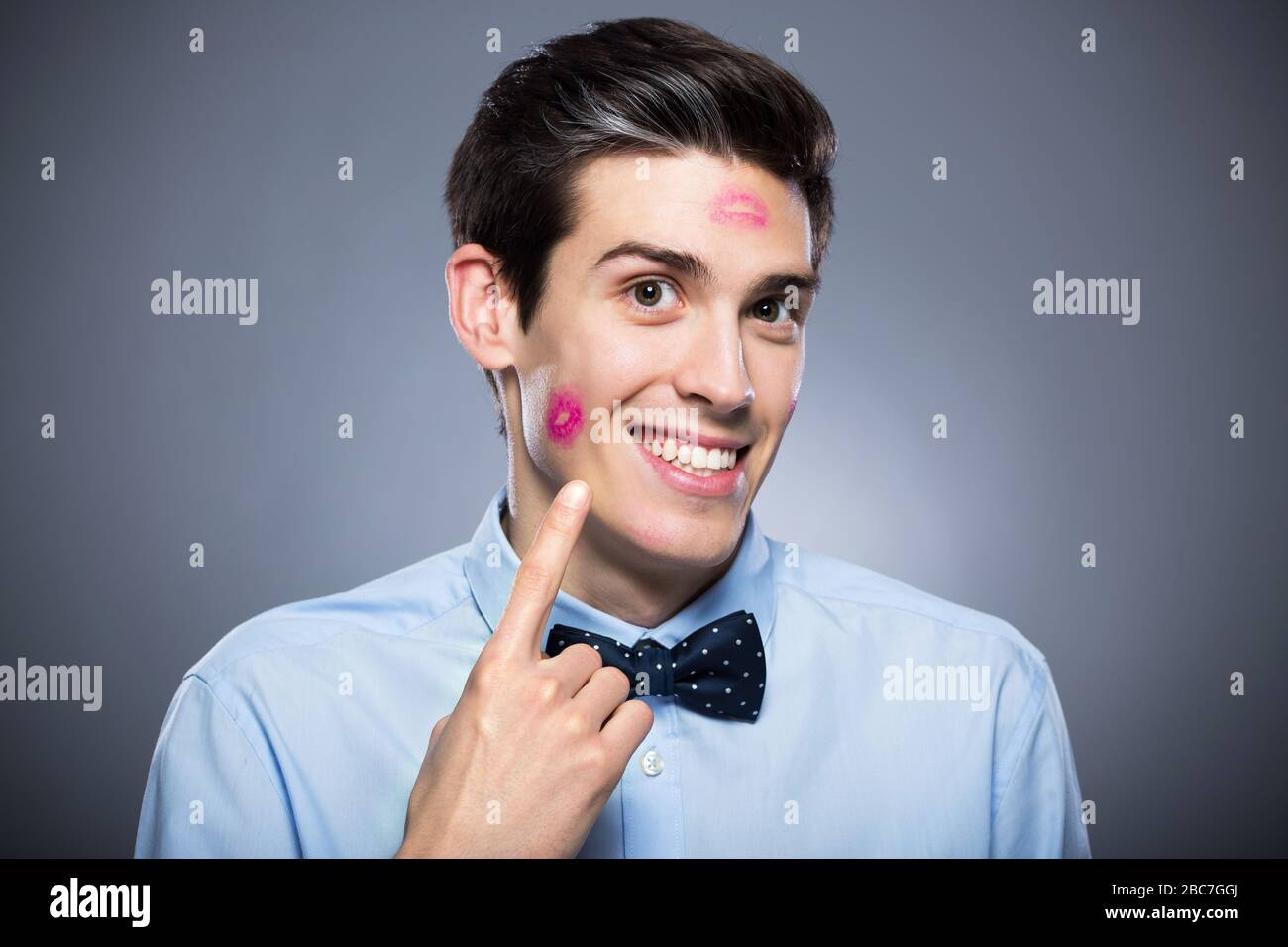 Man with lipstick marks Stock Photo Alamy