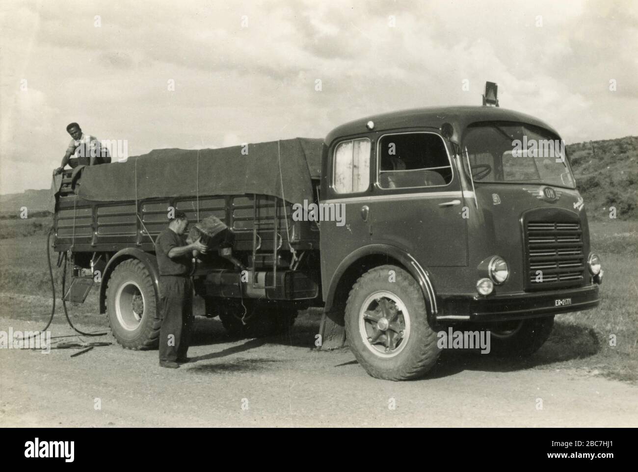 Refilling gas on lorry OM Super Orione, Italy 1950s Stock Photo