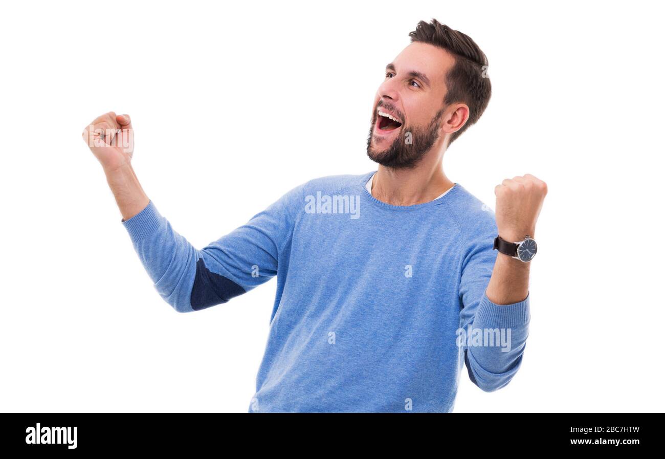 Happy man clenching fists Stock Photo