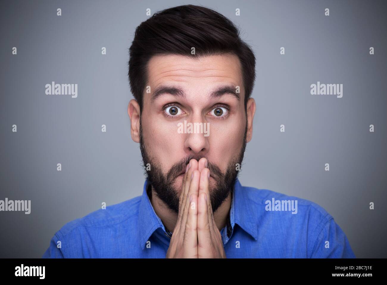 Shocked young man Stock Photo