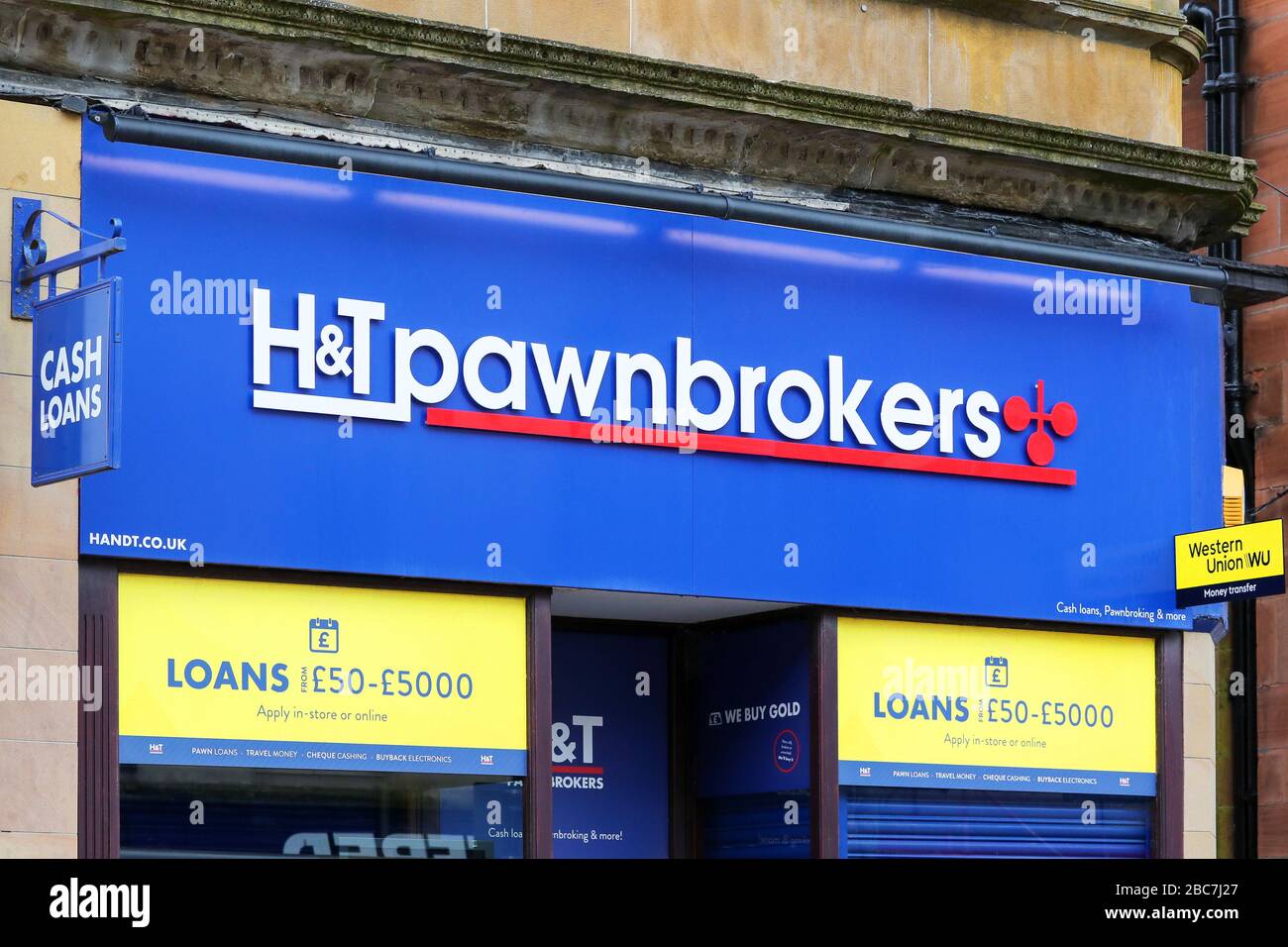 H and T pawnbrokers logo and shop front, Ayr, UK Stock Photo
