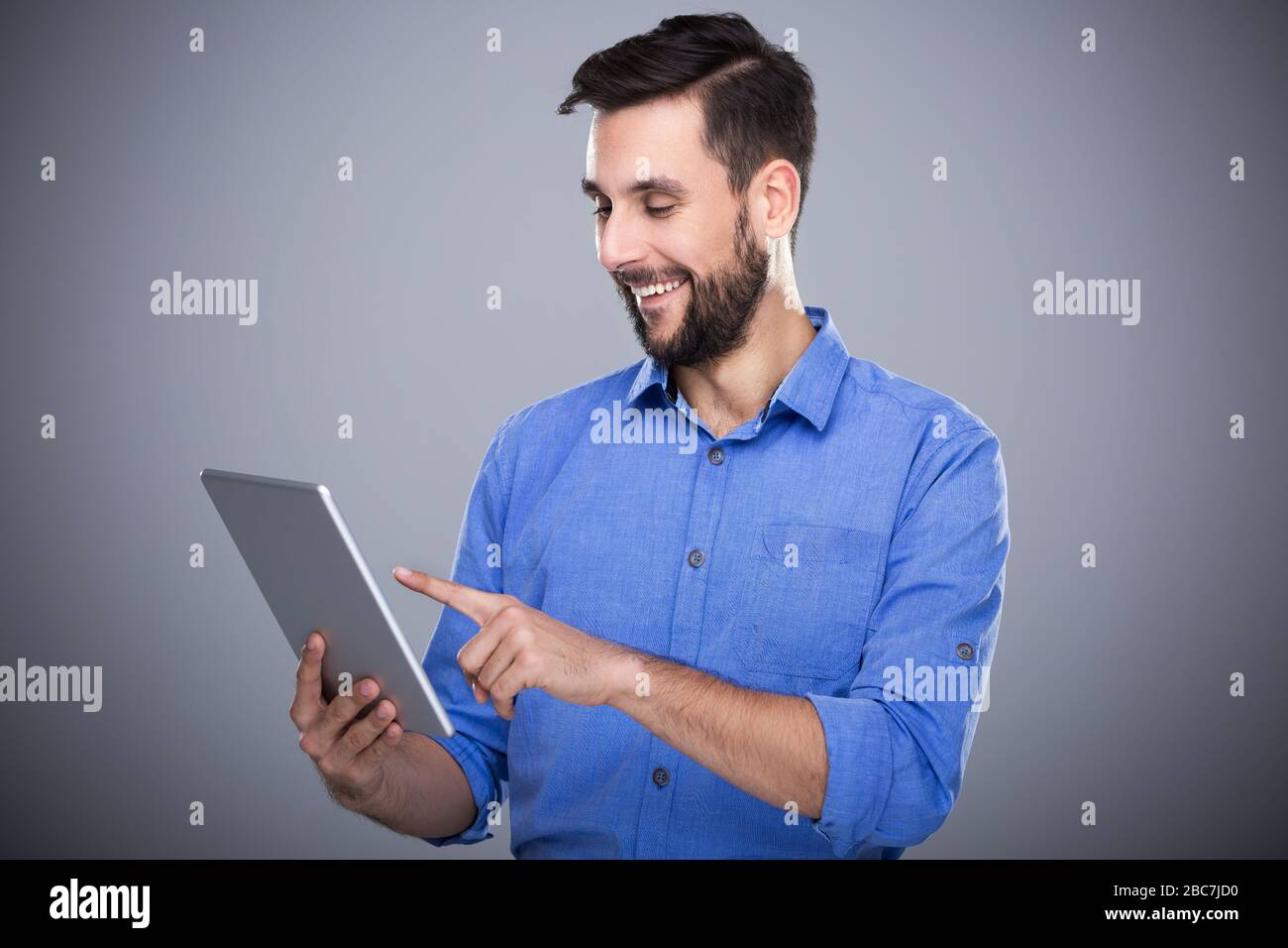 Man holding digital tablet Stock Photo