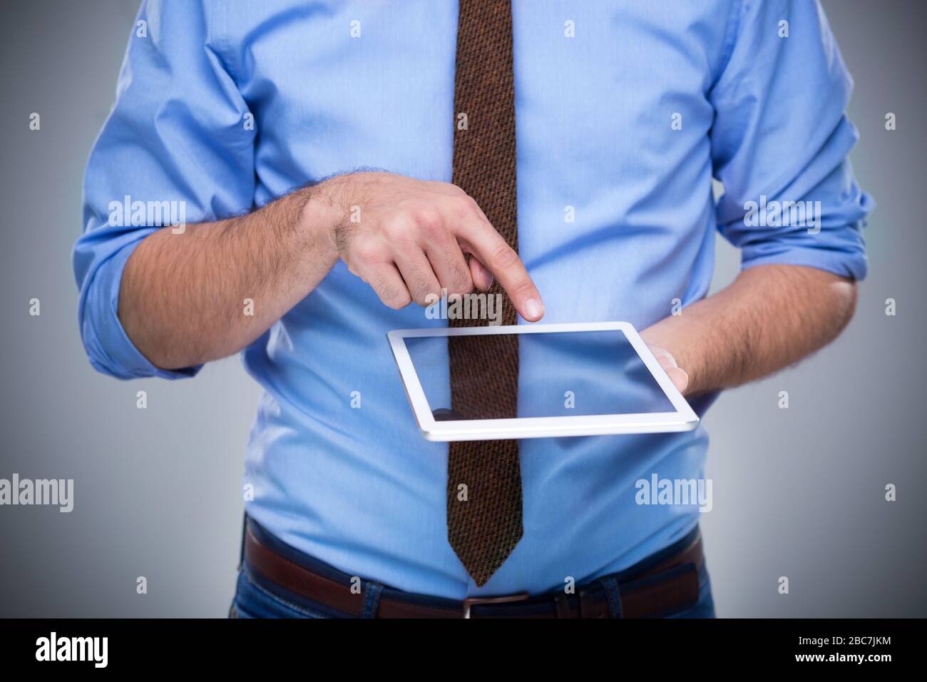 Man holding digital tablet Stock Photo