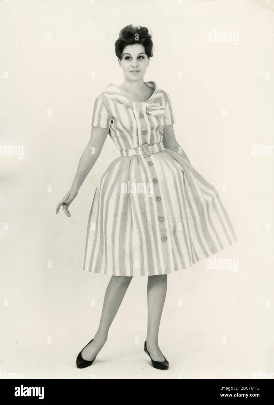 Model from the 1960s presenting an outfit with striped bubble dress, Italy Stock Photo - Alamy Model from the 1960s presenting an outfit with striped bubble dress, Italy Stock Photo - Alamy