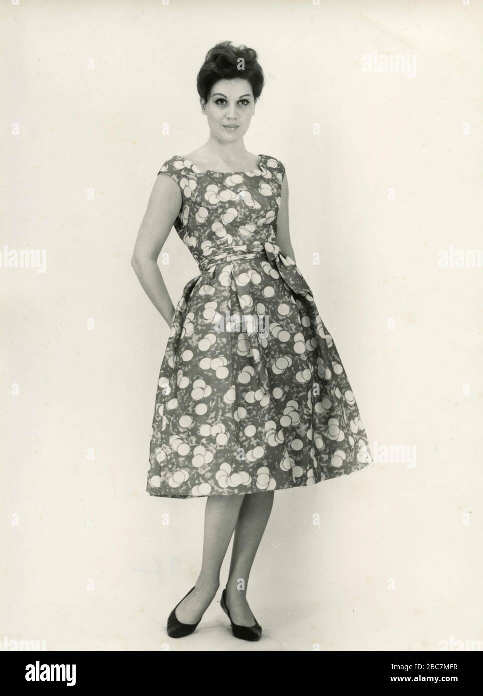 Model from the 1960s presenting an outfit with pattern bubble dress, Italy Stock Photo