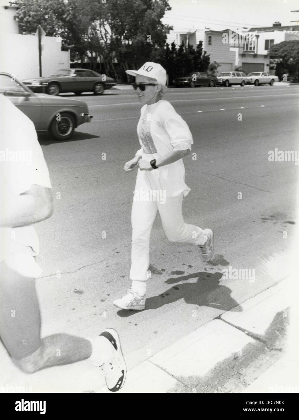 American singer and show girl Madonna jogging, Malibu, Cal, USA 1987 Stock Photo
