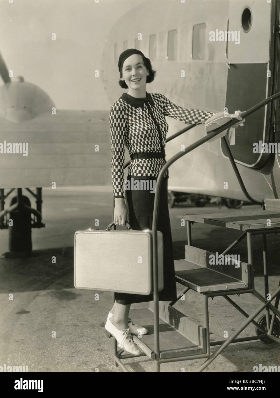 American actress Maureen O'Sullivan wears a knitted dress by Blue Marine, USA 1930s Stock Photo