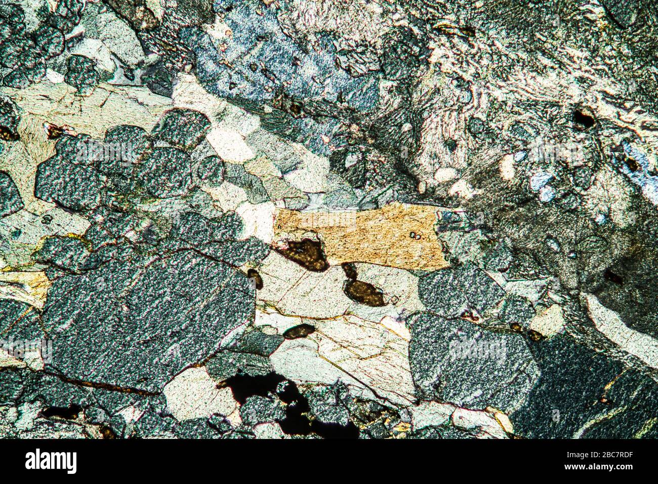bring the action Perpetrator path Eclogite rock under the microscope 100x Stock Photo - Alamy