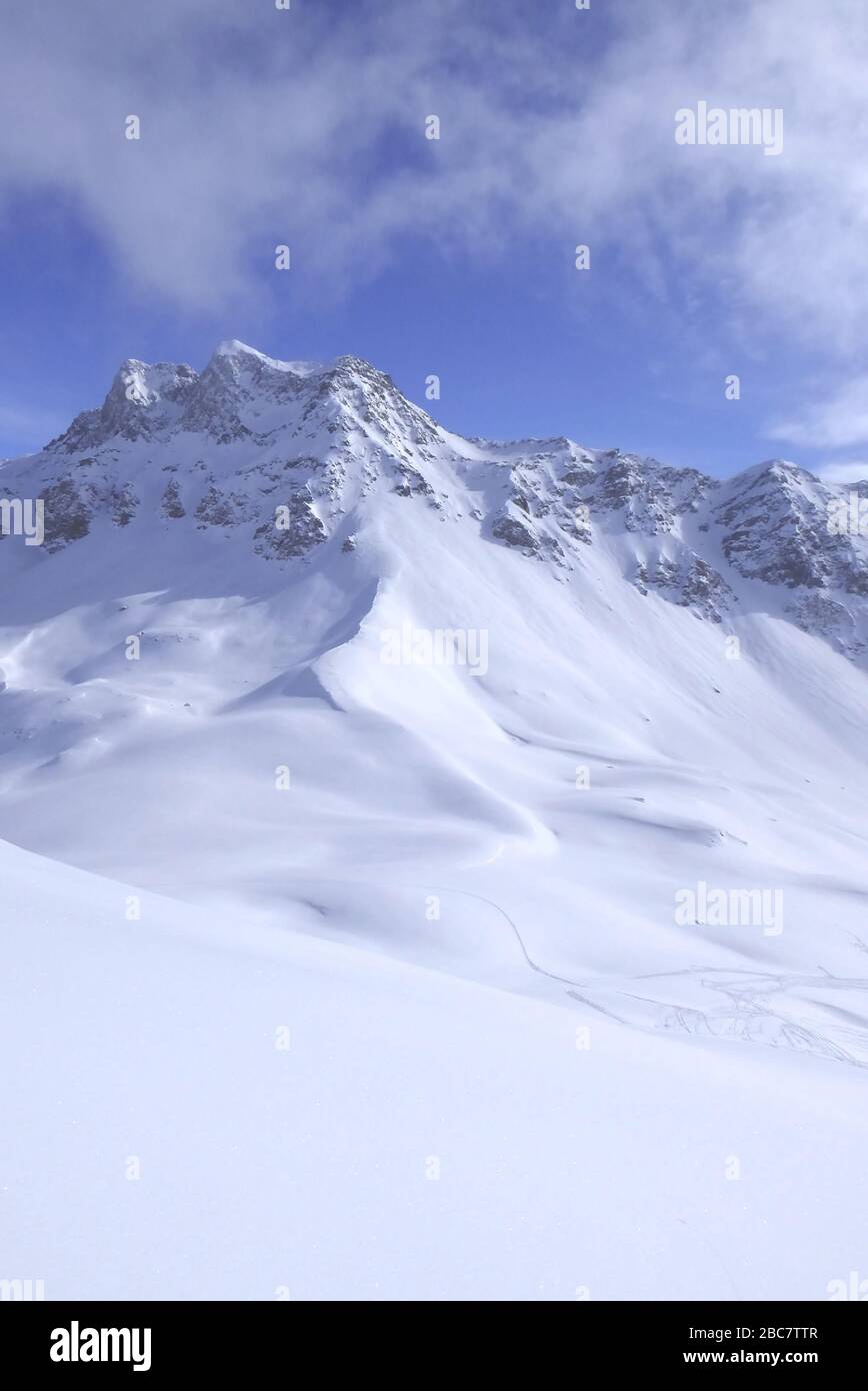 Bivio, Skitour Roccabella, Blick vom Gipfel auf Piz Marterdell. Stock Photo