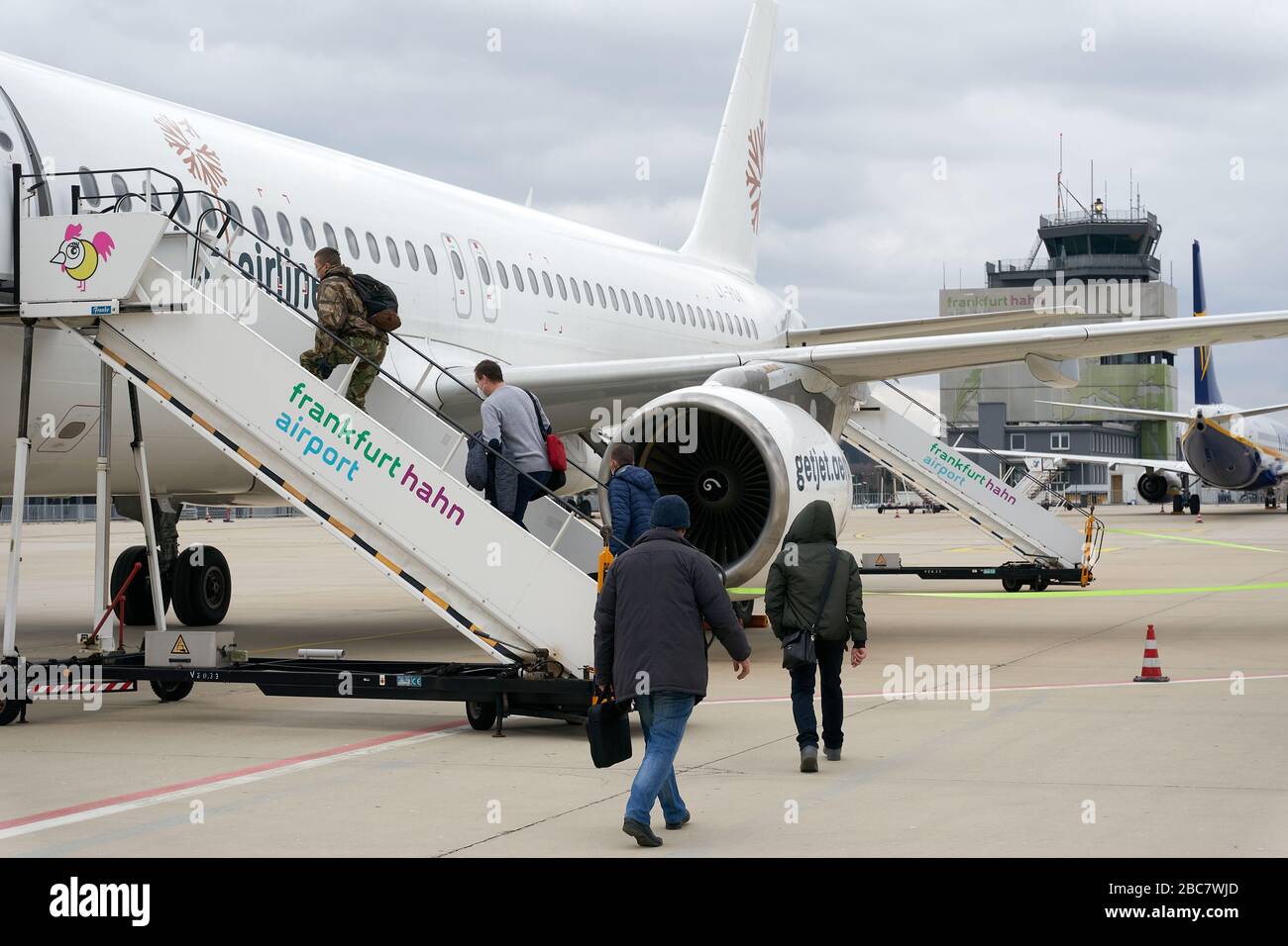 Hahn, Germany. 03rd Apr, 2020. Around 200 truck drivers of a Lithuanian freight forwarding company boarding a plane at Hahn airport. Because of the corona crisis, the company is bringing its drivers back on a charter plane. Credit: Thomas Frey/dpa/Alamy Live News Stock Photo