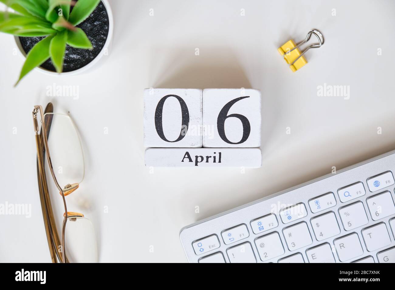 Date on white wooden cubes - the sixth, 6 April on a white table. Top view.  Top view. Close up Stock Photo - Alamy