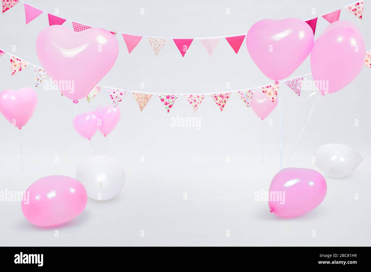 pink and white party plates