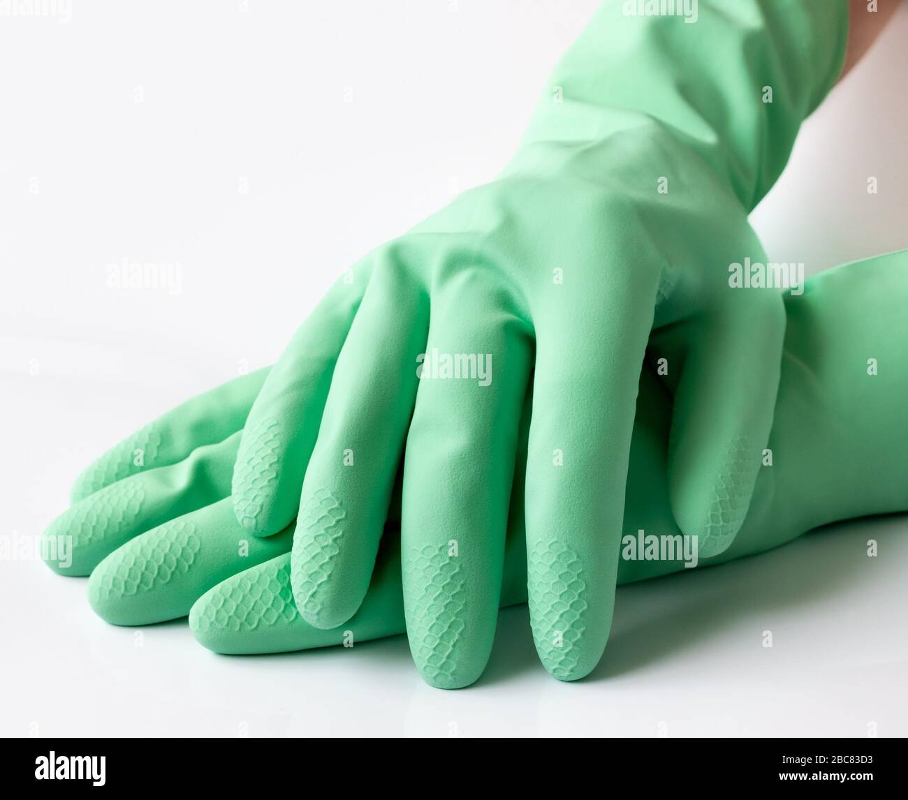 white dishwashing gloves