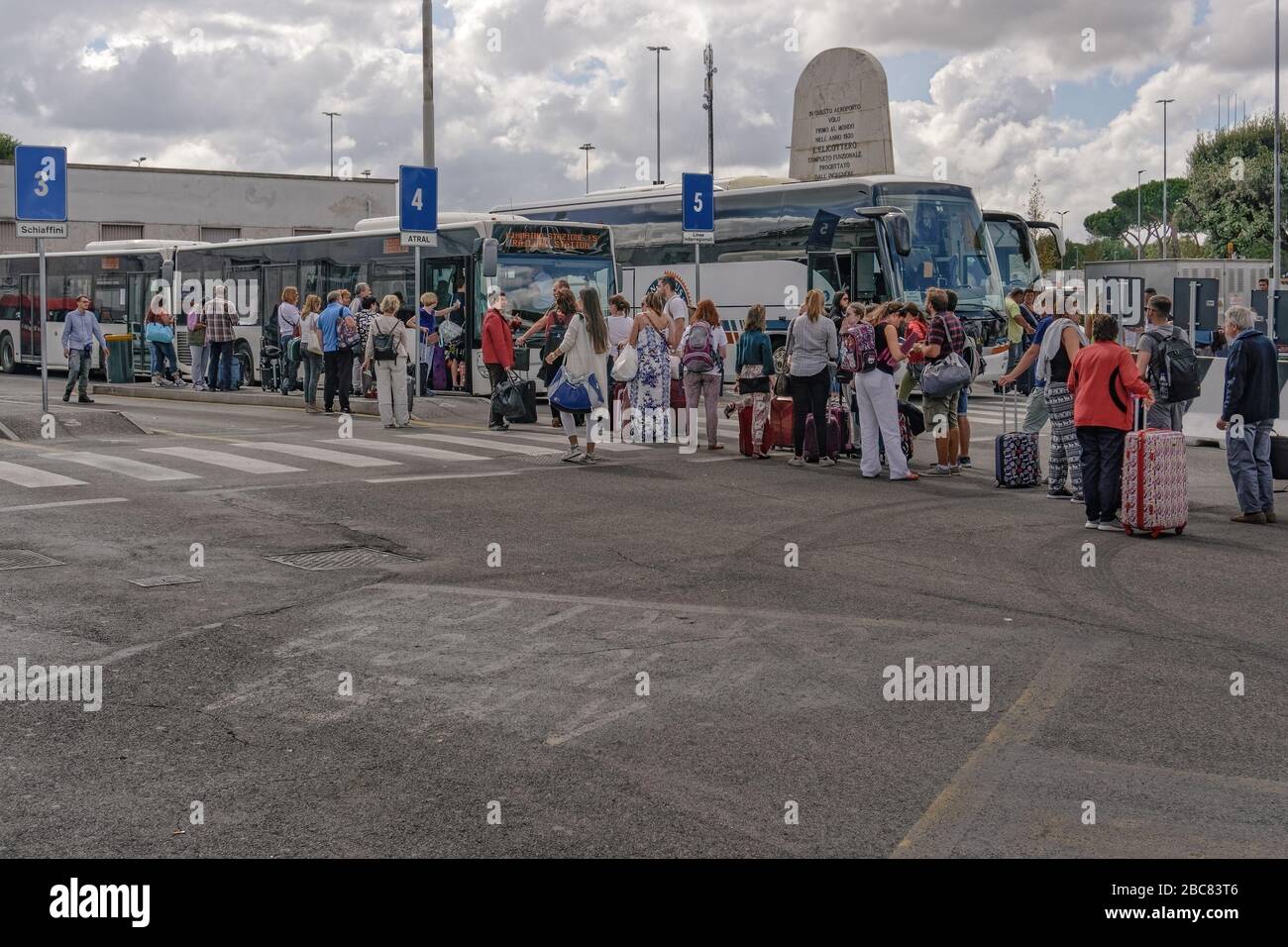 Rome, Italy Ciampino airport terminal bus stop with crowd. Aeroporto G