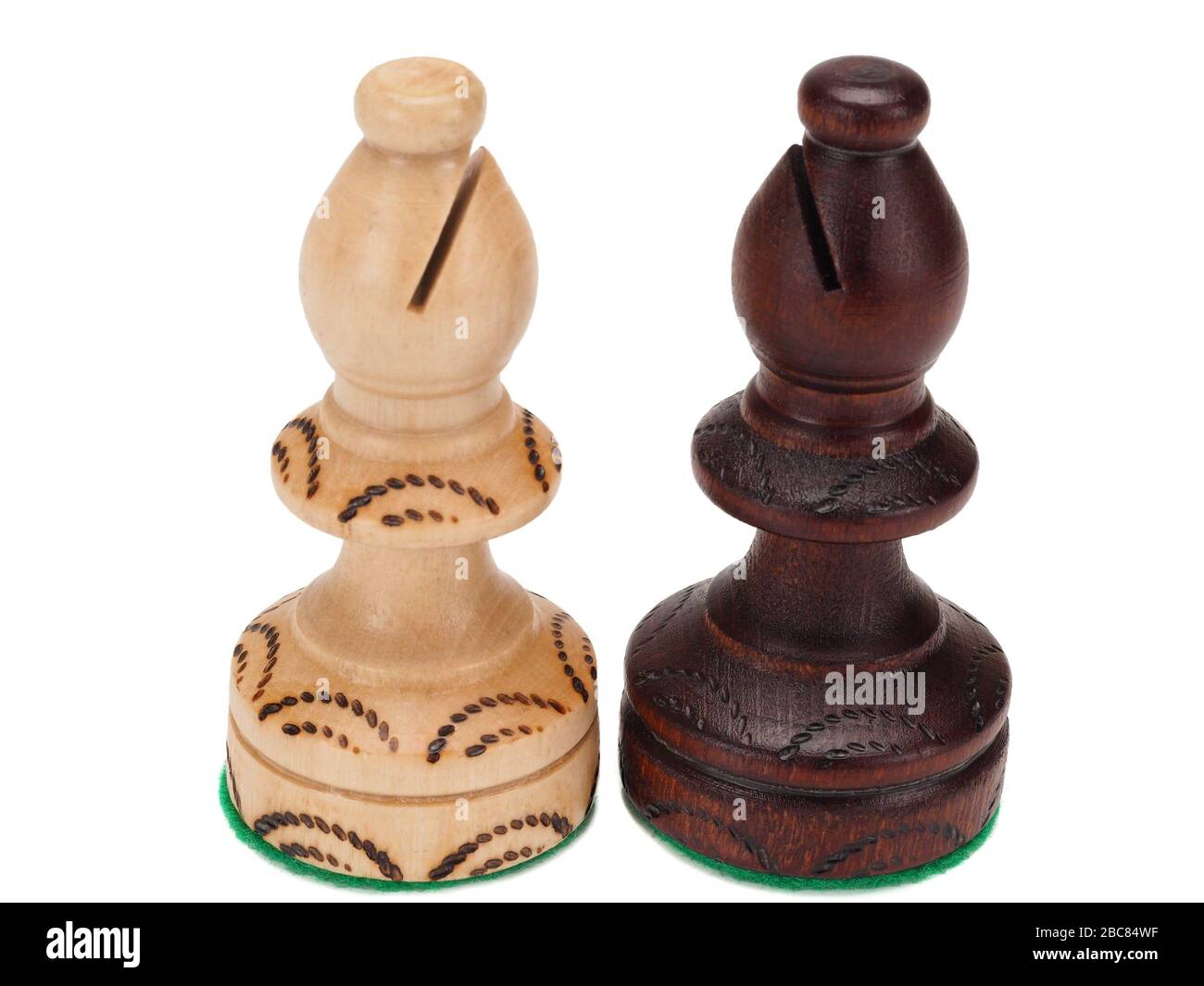 handmade chess bishops on white background Stock Photo