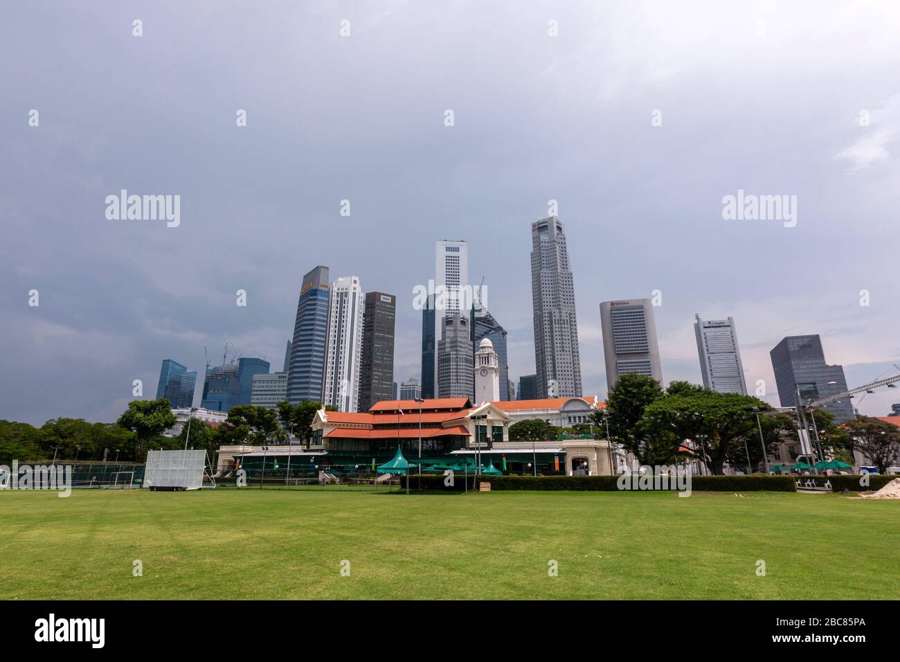 Singapore Cricket Club from Padang and the central business district behind, Singapore Stock Photo