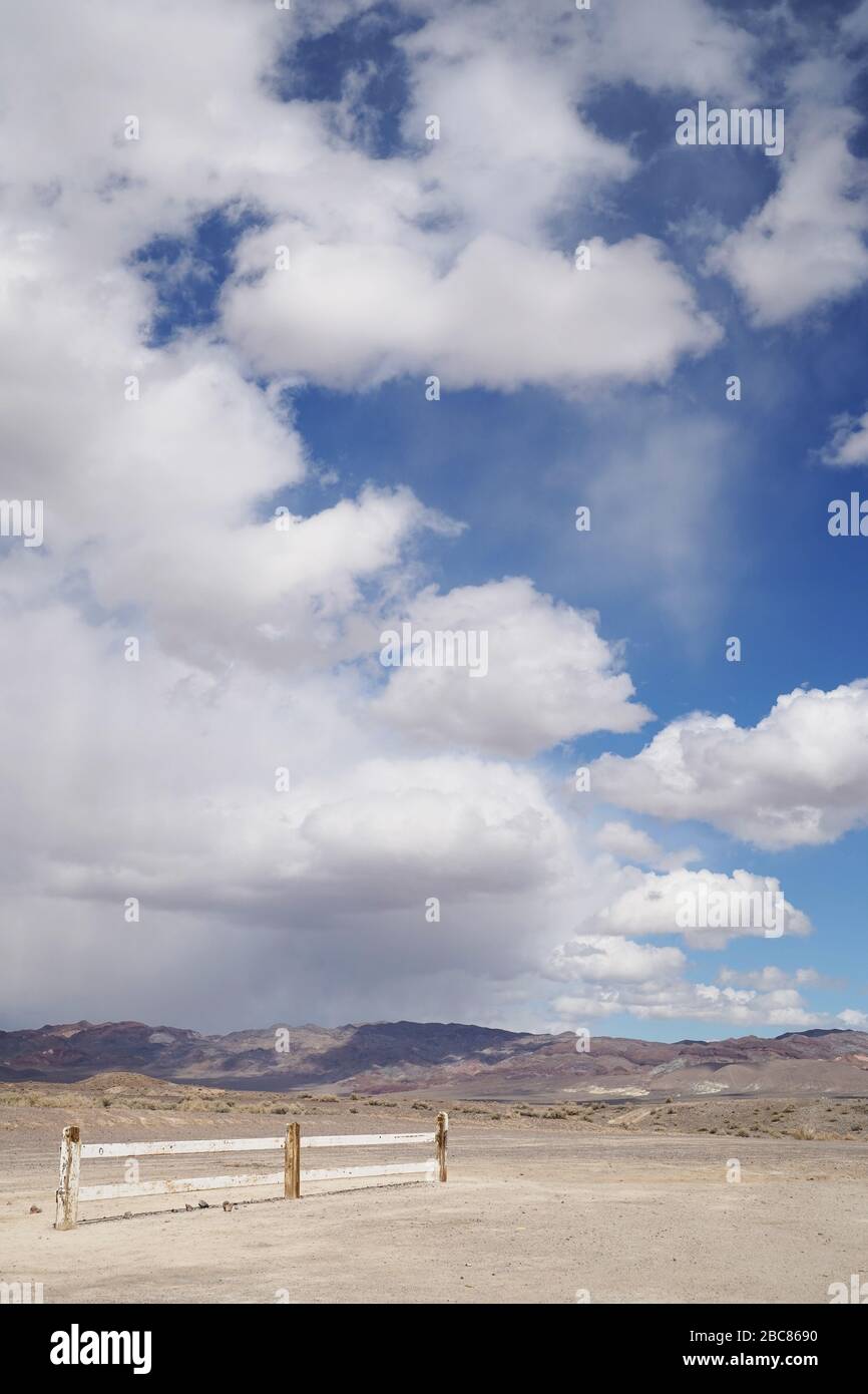 Fluffy white clouds and blue sky in a rural landscape with a storm ...
